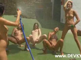 Five basketball girls fingering naked on a court