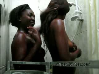 Filthy African lesbians shower with sexy stranger